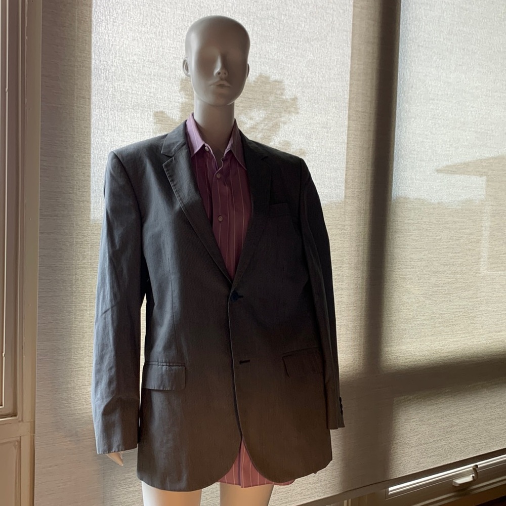 Gray pinstriped suit. 42L. Alexander McQueen.